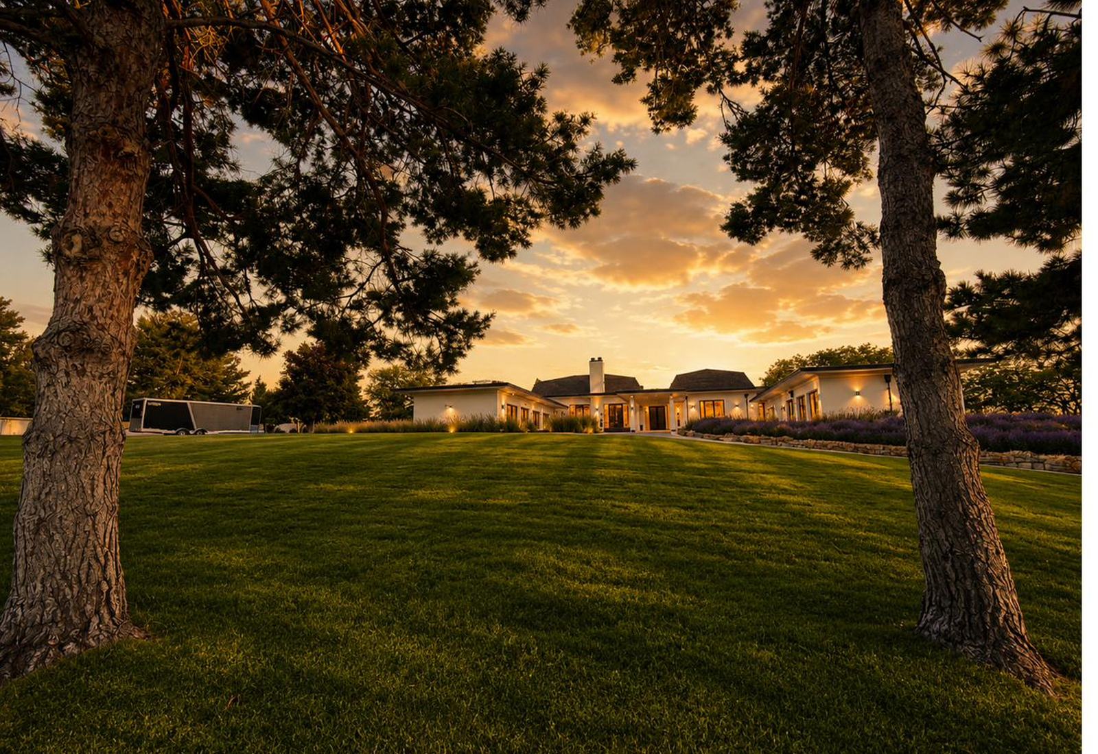 Trophy residential estate for sale in Boise, Idaho — sunset over the walled East End foothills property