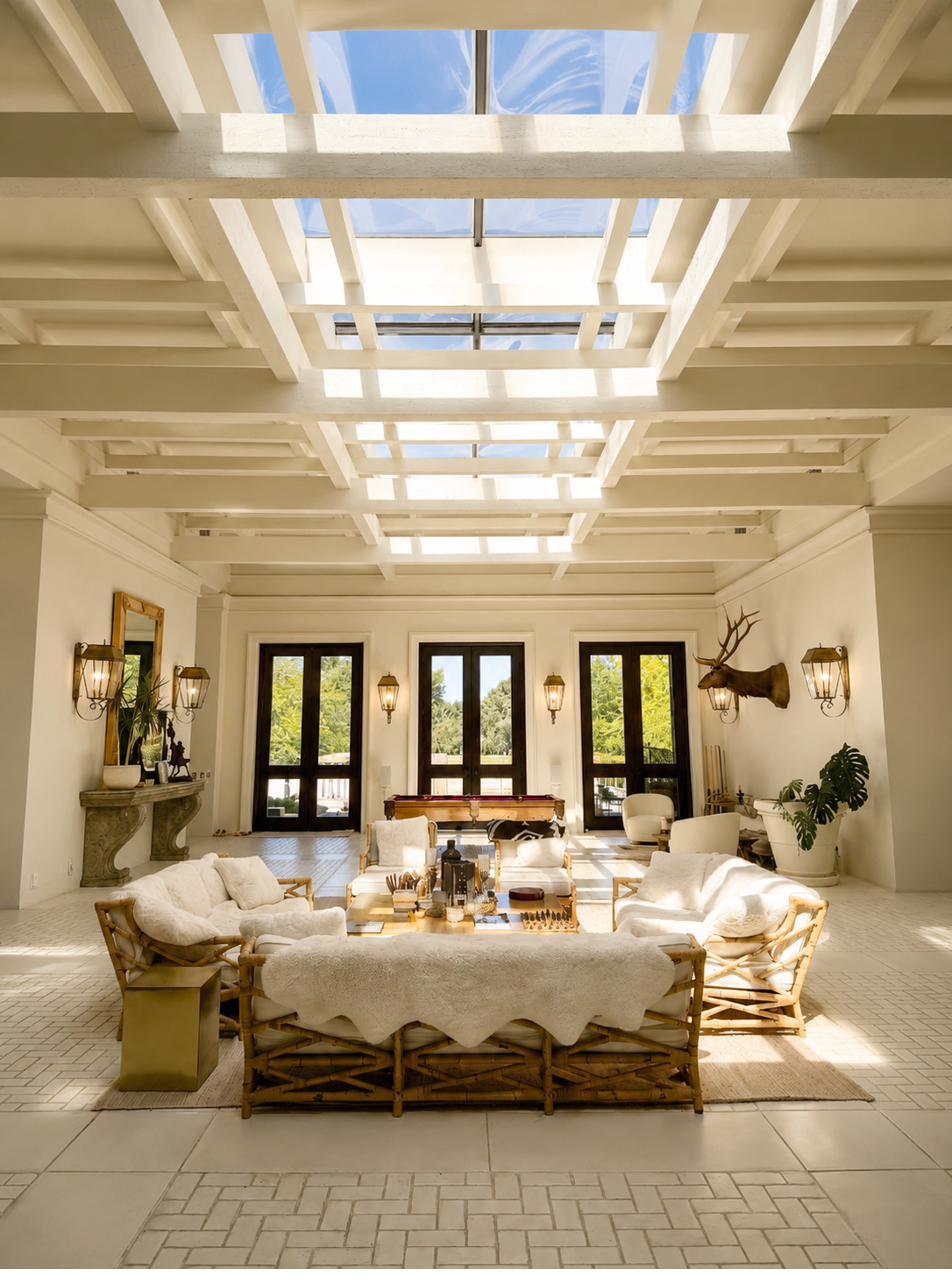 The skylit great room of the Boise estate under coffered glass