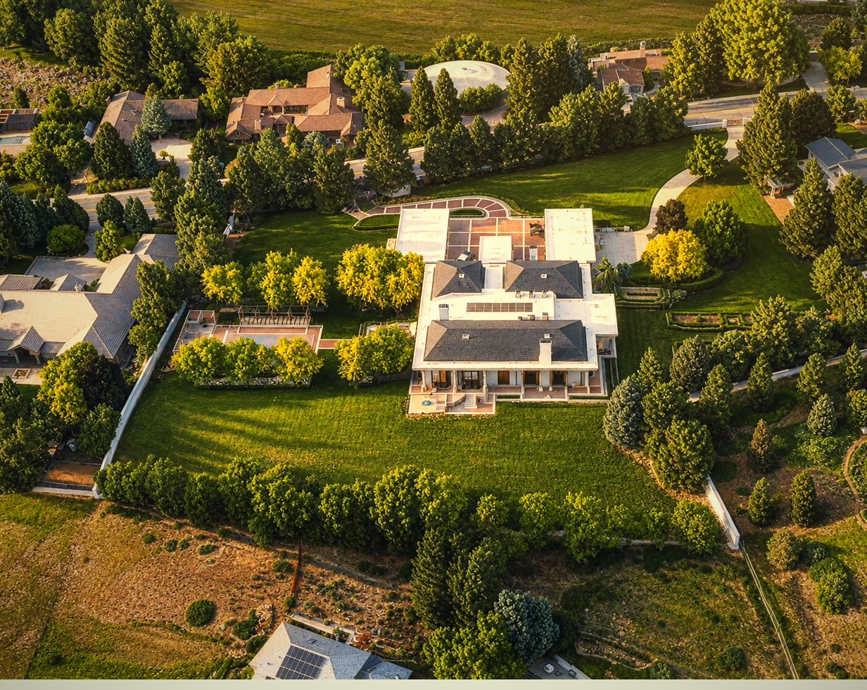 Aerial view of the walled estate against the Boise foothills