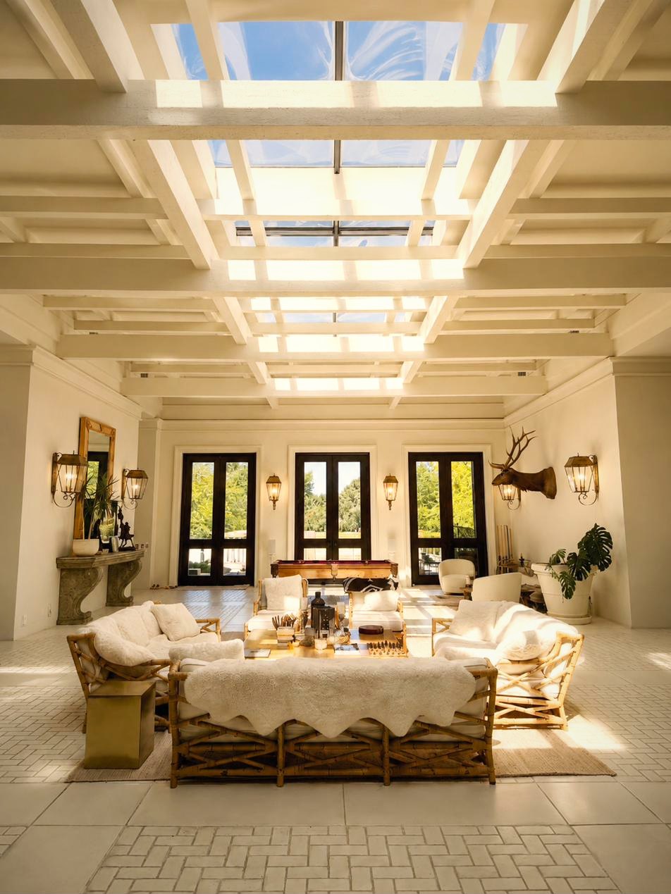 The skylit atrium looking east — daylight and orientation at the center of the plan